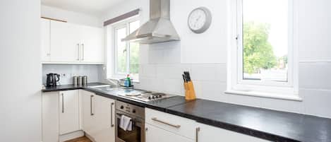 Apartamento Deluxe, no fumadores, cocina | Cocina privada | Hervidor eléctrico