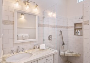 Shower, hair dryer, towels