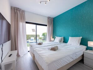 2 habitaciones, tabla de planchar con plancha, cuna de viaje y wifi 