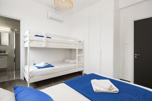 3 habitaciones, tabla de planchar con plancha y acceso a internet