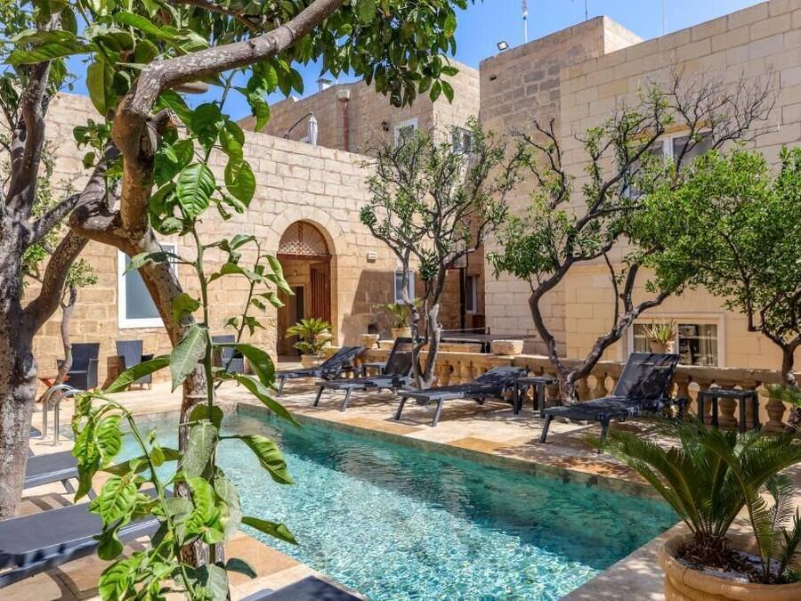 Seasonal outdoor pool, pool loungers