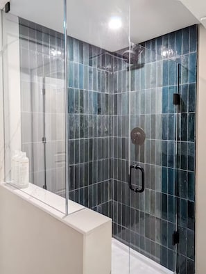 Combined shower/tub, hair dryer, towels, soap