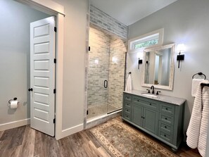 Combined shower/bathtub, hair dryer, towels, soap
