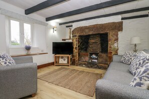 Cottage | Living area | TV, fireplace, Netflix, streaming services