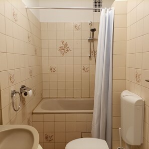 Chuveiro/banheira combinados, papel higiênico