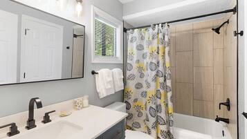 Combined shower/tub, hair dryer, towels, soap