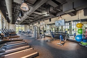 Stay fit on the go with our well-equipped gym featuring treadmills, weight machines, and free weights.