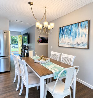 Dining area with  New table and chairs September 2026