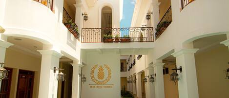 Outdoor pool, open 7:00 AM to 8:00 PM, pool umbrellas