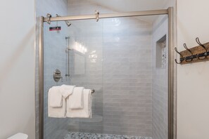 Bathtub, hair dryer, towels