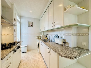 Coffee/tea maker, fridge, microwave