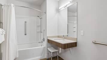 Accessible King Studio (Self Check-in) | Bathroom | Combined shower/tub, free toiletries, hair dryer, towels