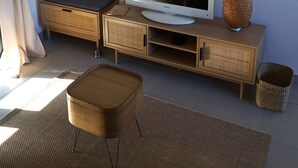 A modern living room with a flat-screen TV, wooden furniture, a woven basket, and a woven floor mat. - Cosy new house in Provence, terrace (PIOLENC)