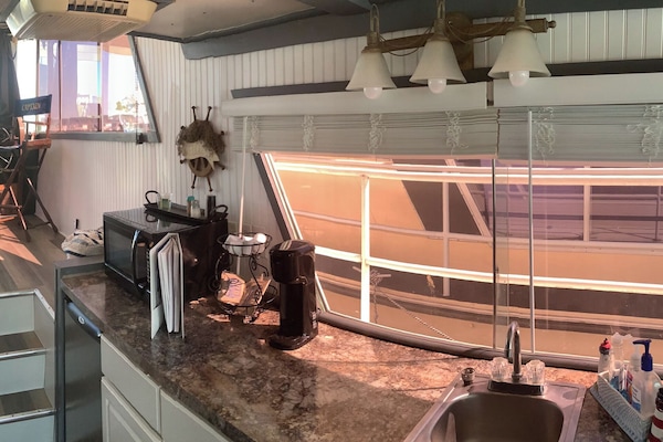 Fridge, microwave, coffee/tea maker, paper towels