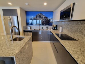 Private kitchen - Villa la Valencia's spacious suites with a modern contemporary design. (San José del Cabo)