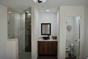 Combined shower/tub, hair dryer, towels, soap