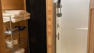 Shower, towels, soap, shampoo