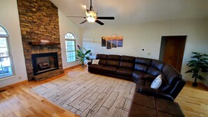 Smart TV, fireplace, table football, books