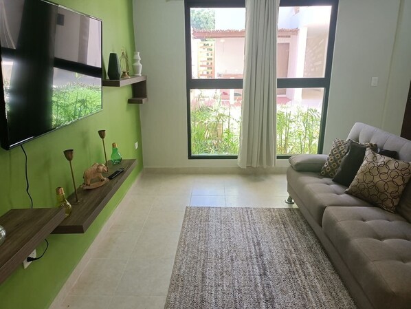 Exclusive Apartment | Living room | 50-inch Smart TV with cable channels, TV