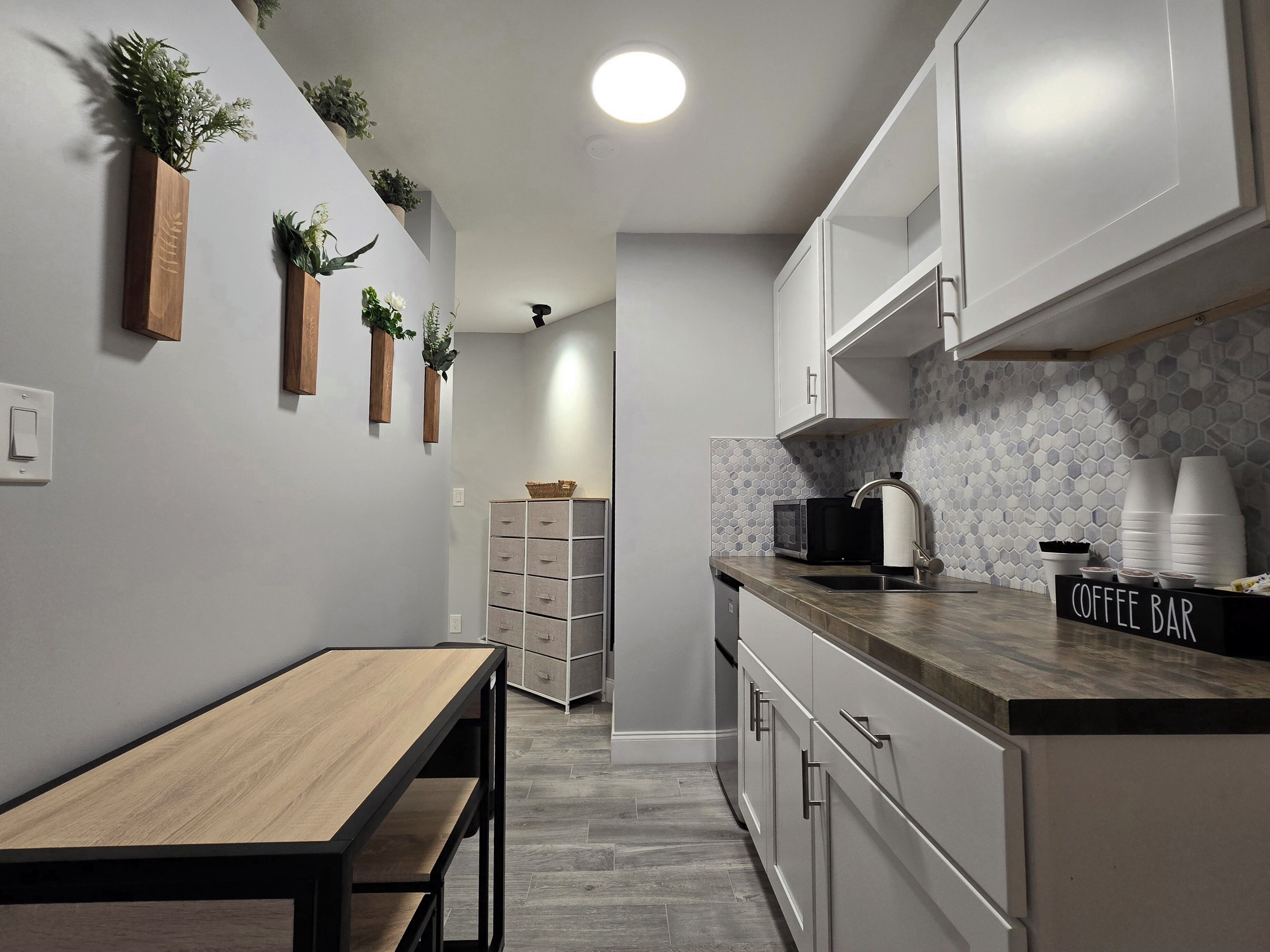 luxury single room, 1 king bed with sofa bed, pool view | private kitchenette | fridge, microwave, freezer, paper towels