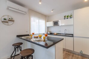 Fridge, microwave, coffee/tea maker, toaster