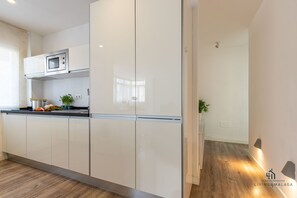 Fridge, microwave, coffee/tea maker, toaster