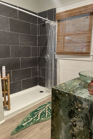 Shower, hair dryer, towels, soap