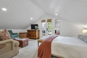 1 habitación, tabla de planchar con plancha y cuna de viaje 