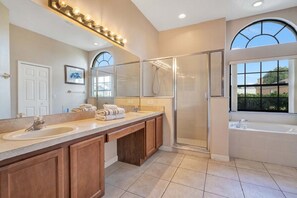 Bathtub, hair dryer, towels, soap
