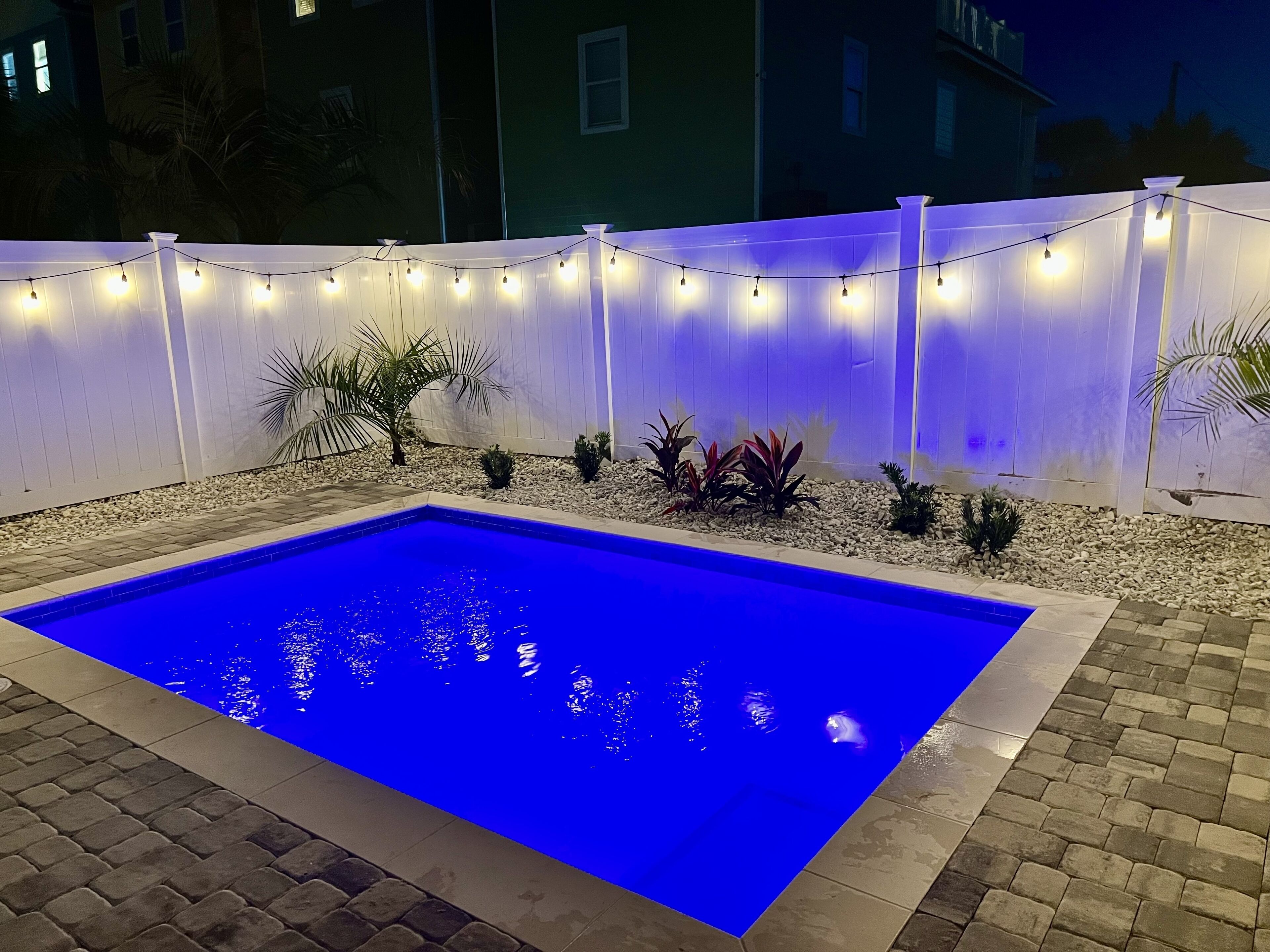 Private heated saltwater pool (night view)