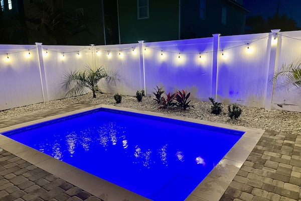 Private heated saltwater pool (night view)