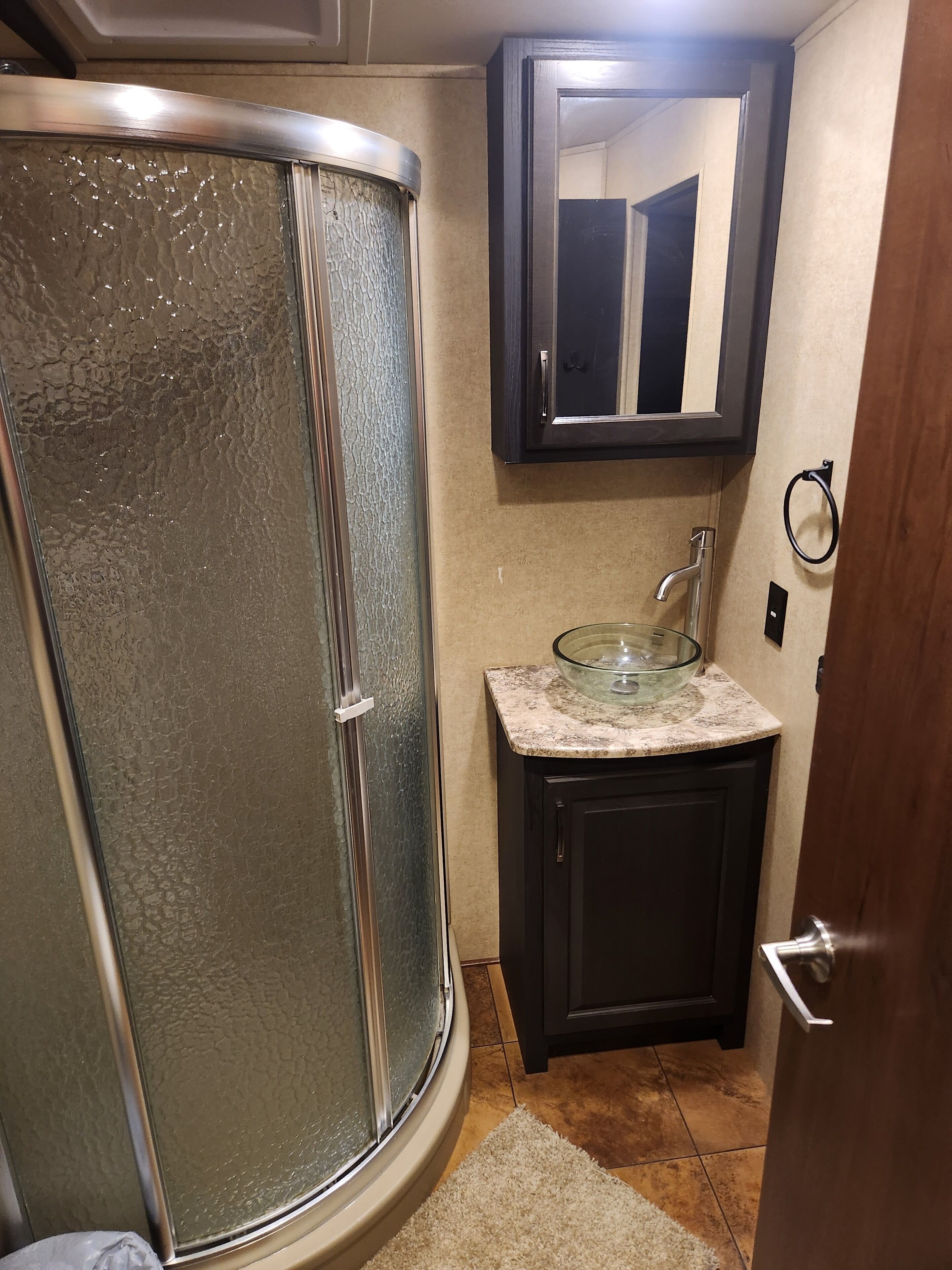 Shower, towels, soap, toilet paper