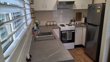 Fridge, microwave, oven, coffee/tea maker