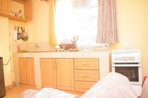 Apartamento empresarial | Cozinha privada | Geladeira, micro-ondas, liquidificador