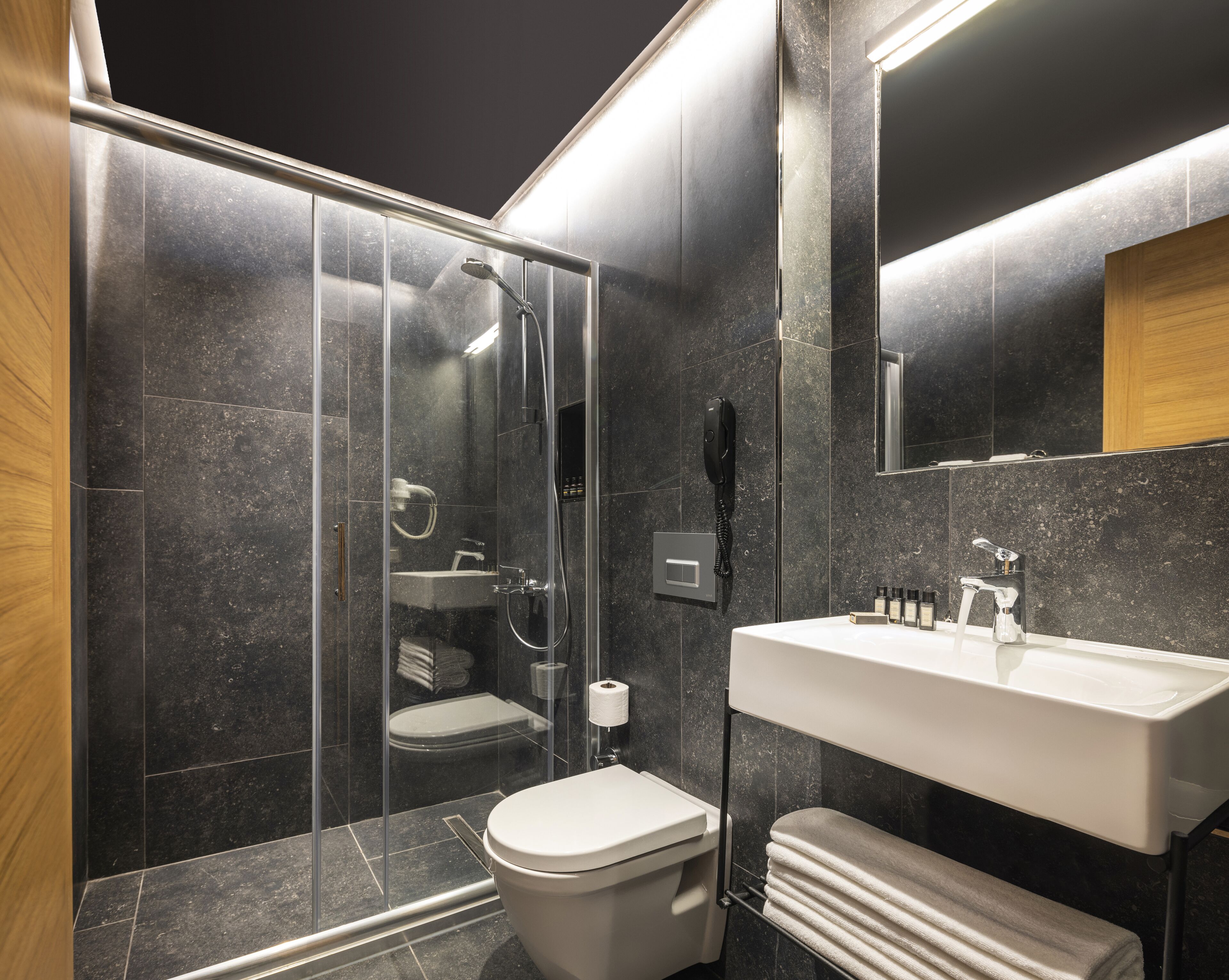 Shower, rainfall showerhead, eco-friendly toiletries, hair dryer