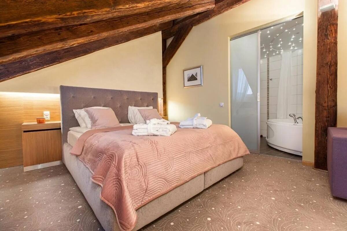 Suite, Sauna | Minibar, desk, WiFi (free), bed sheets