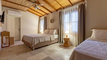 Standard Triple Room | In-room safe, iron/ironing board
