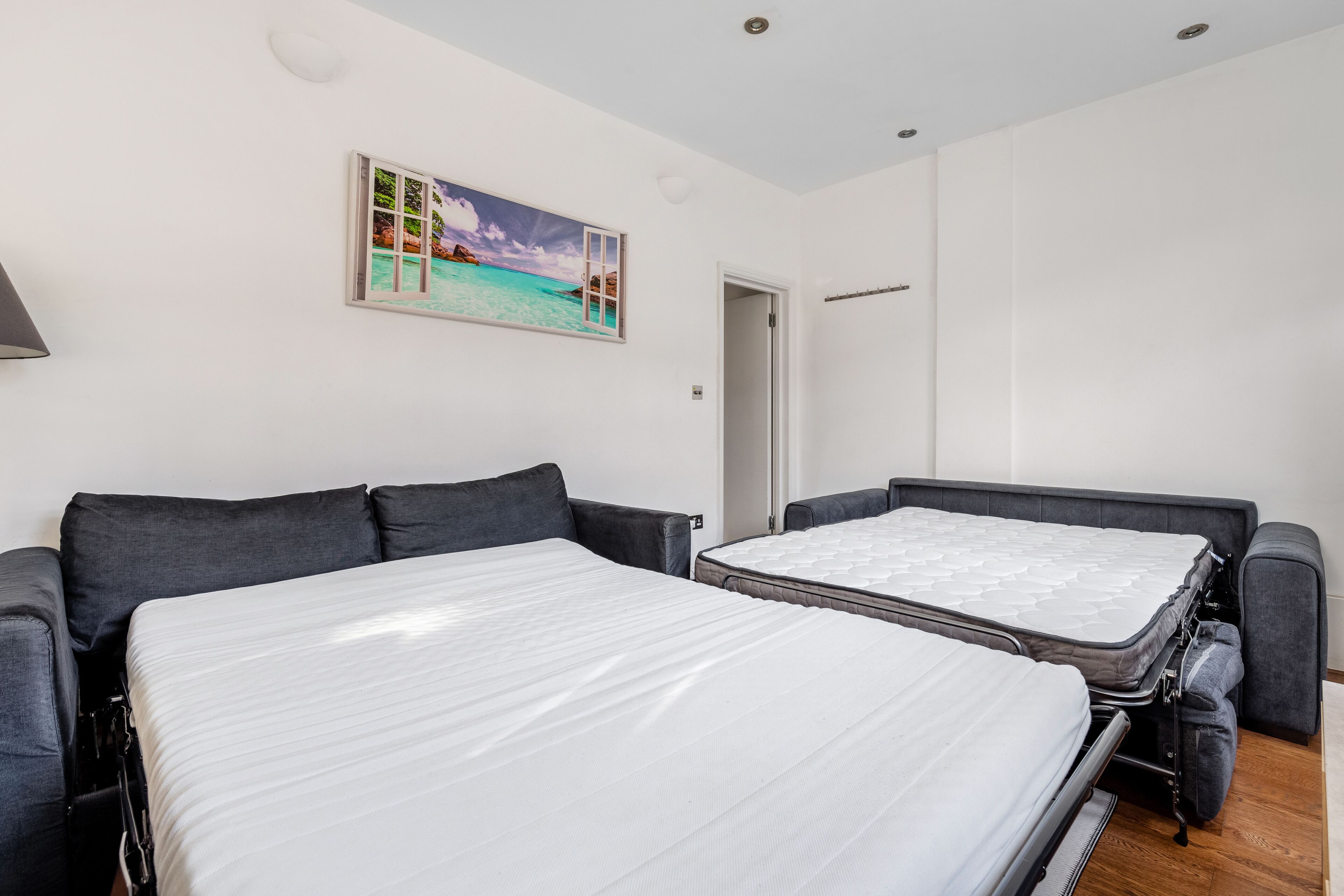 2 bedrooms, desk, iron/ironing board, travel cot