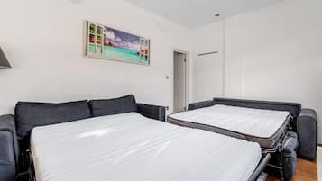 2 bedrooms, desk, iron/ironing board, travel cot