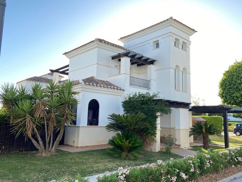 Chalet-villa in urbanization with golf course