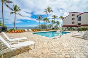 A heated pool - Kapaa Shore Resort A101, Oceanfront, King Bed, Ground Floor, End Unit, AC (Kapaa)