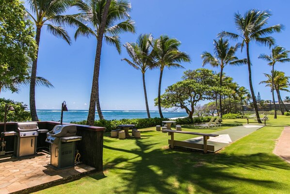 Outdoor dining - Kapaa Shore Resort A101, Oceanfront, King Bed, Ground Floor, End Unit, AC (Kapaa)