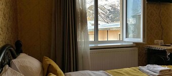A cozy house with veranda and big yard, with the best view on Kazbegi mountain..