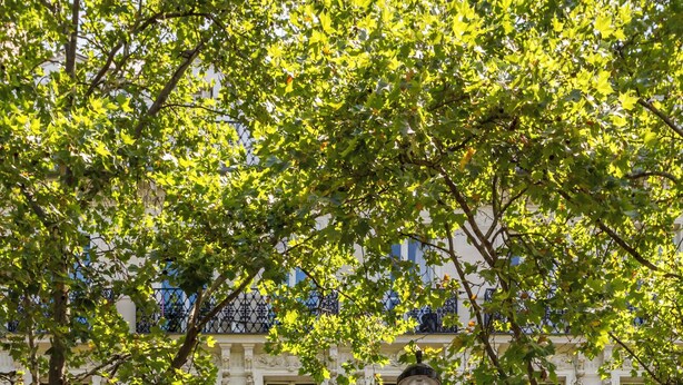 A multi-story building with a classic architectural style, featuring balconies and large windows. - Merveil - Family Suite - Marais - Sebastopol III (Paris)