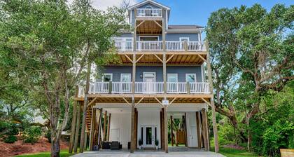 All new 5br/4.5ba home w/ocean views! Close to beach w/elevator and day dock.