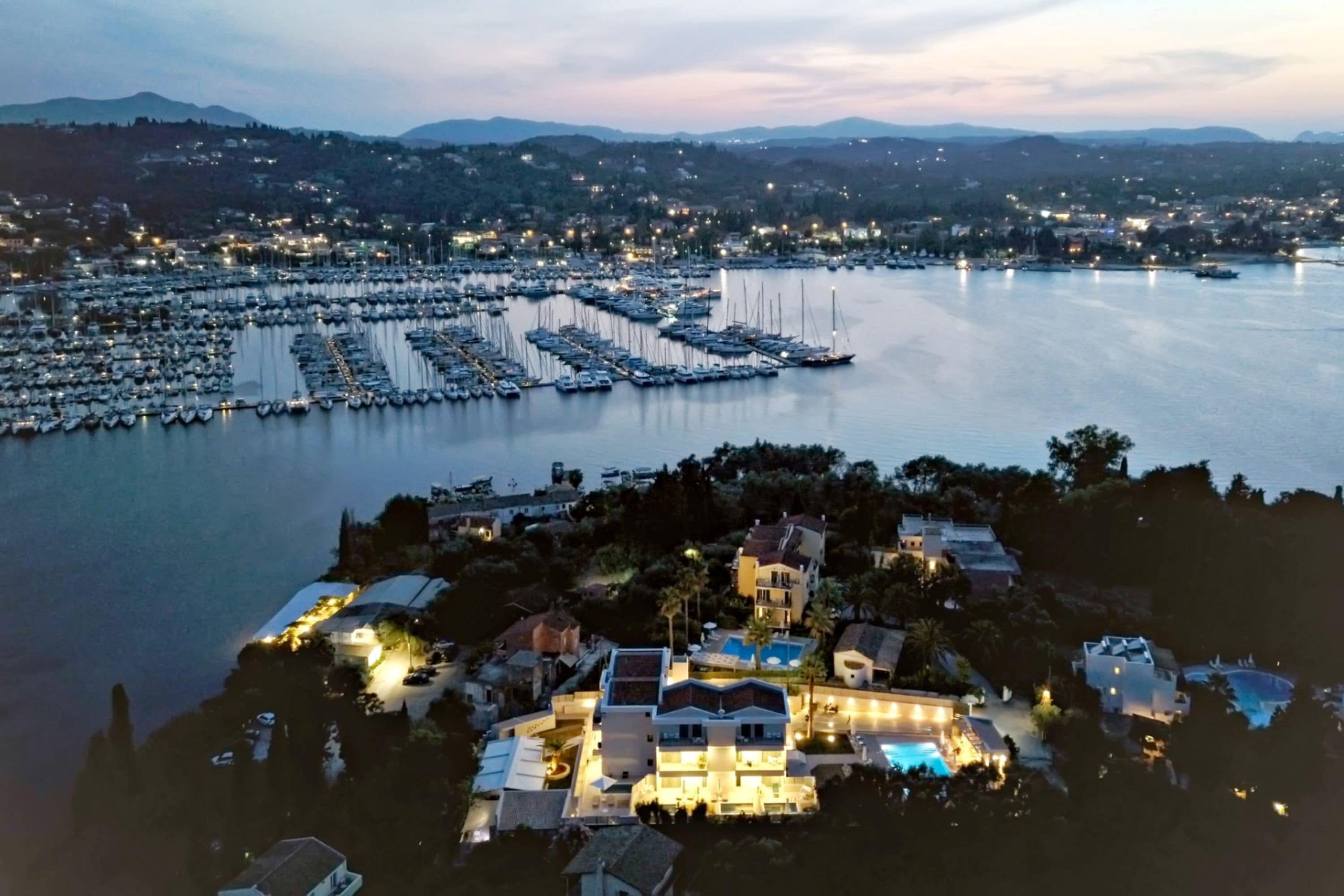 A marina with numerous boats docked in a geometric pattern.