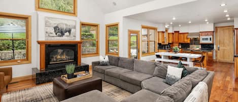 Smart TV, fireplace, table football, books