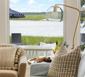 TV, fireplace - VRBO 2025 Rental of the Year | Folly Riverfront Retreat w/ Dock & Pool (Folly Beach)