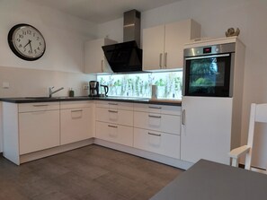 Réfrigérateur, four, plaque de cuisson, lave-vaisselle