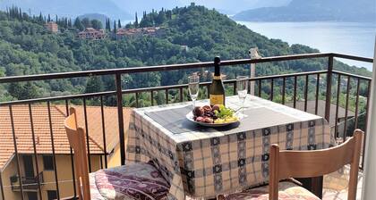 Charming Perledo Retreat with Lake View, Balcony & Parking